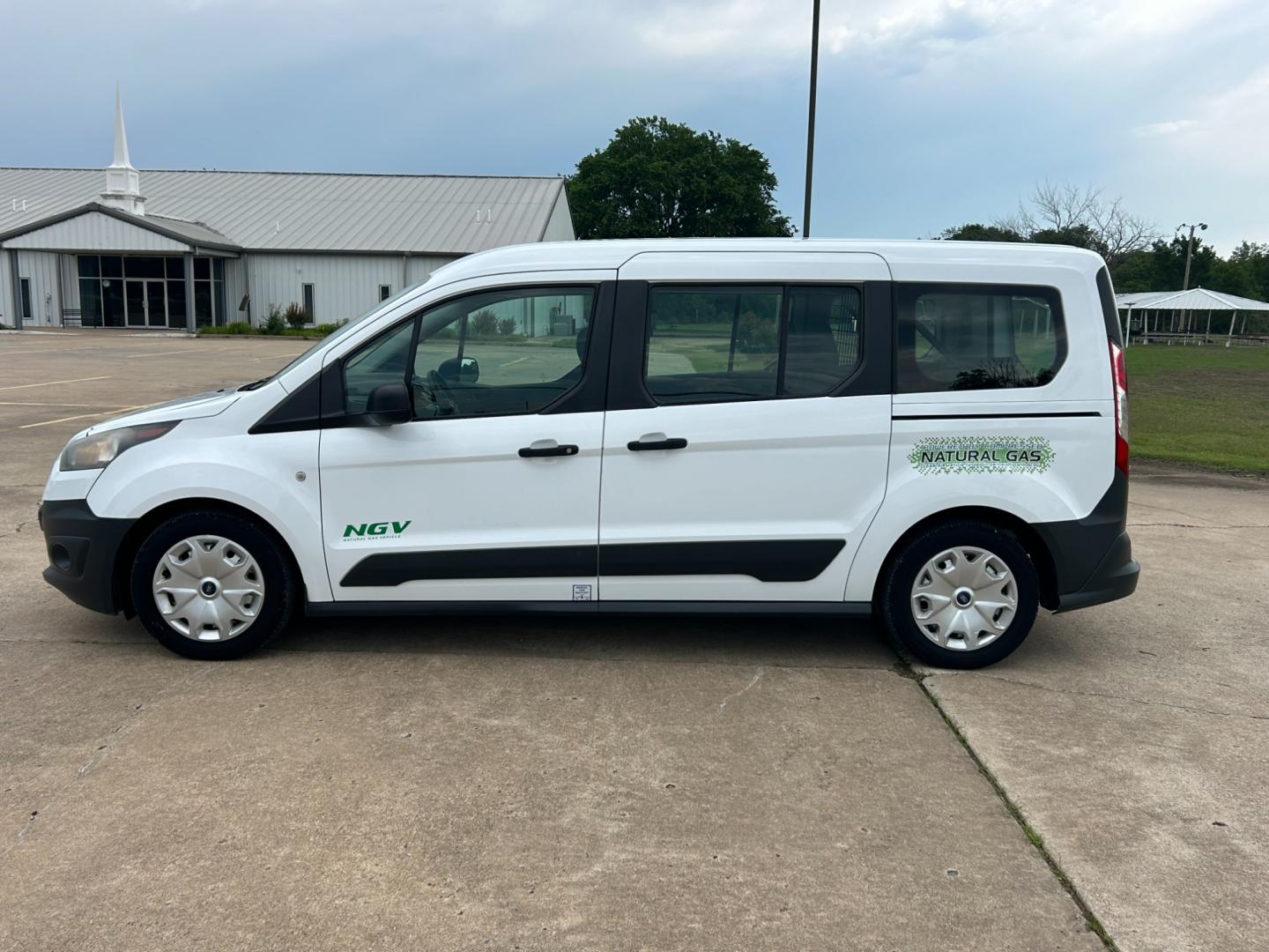 2014 White /Gray Ford Transit Connect Wagon XL w/Rear Liftgate LWB (NM0GE9E75E1) with an 2.5L L4 DOHC 16V engine, 6-Speed Automatic transmission, located at 17760 Hwy 62, Morris, OK, 74445, (918) 733-4887, 35.609104, -95.877060 - 2014 FORD TRANSIT CONNECT HAS 2.5L ENGINE, FEATURES POWER LOCKS, POWER WINDOWS, POWER MIRRORS, AM/FM STEREO, CRUISE CONTROL, BLUETOOTH HANDS-FREE CALLING, BACKSEAT,IT RUNS ON CNG (COMPRESSED NATURAL GAS) OR GASOLINE. A PREMIER ALTERNATIVE FUEL CONVERSION THAT IS EPA-APPROVED. EXTREMELY CLEAN-BURNING - Photo#7